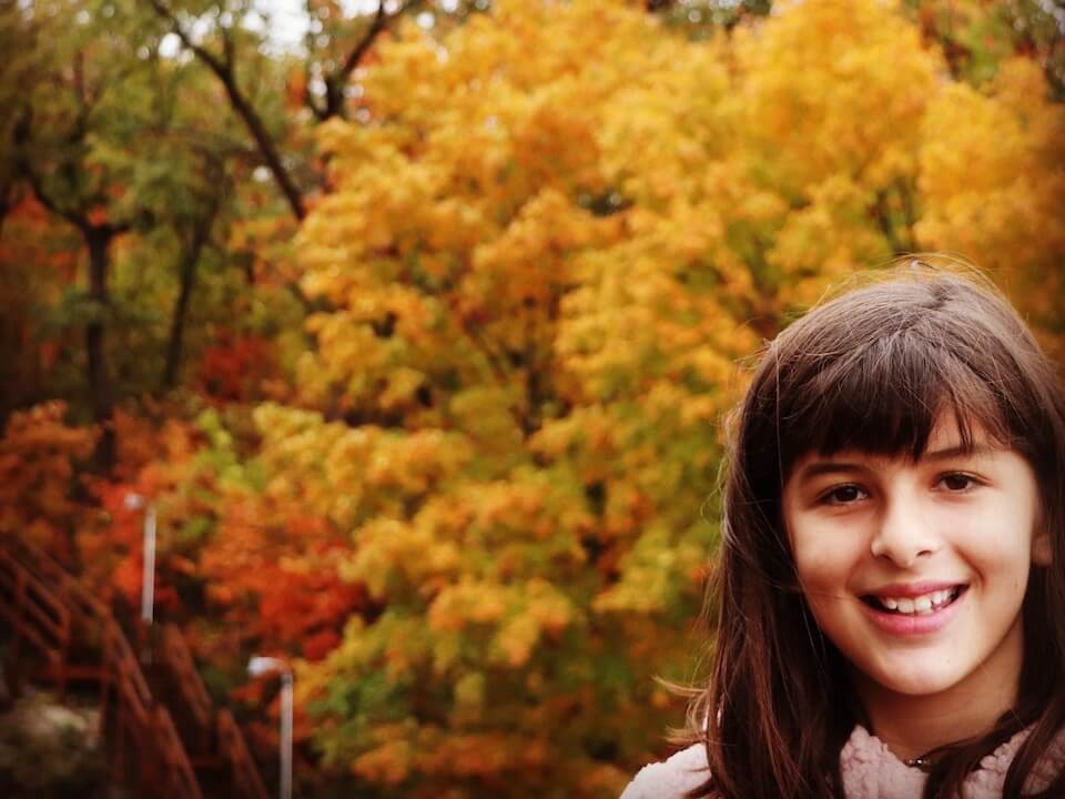 Payton and the fall foliage at Rock City